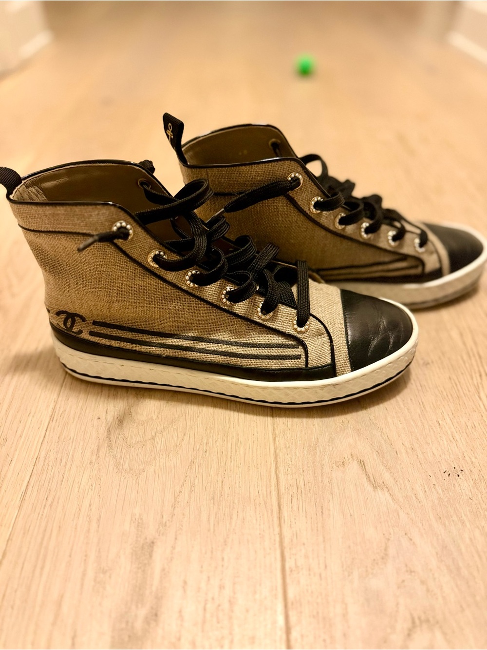 CHANEL Beige and Black High-Top Sneakers